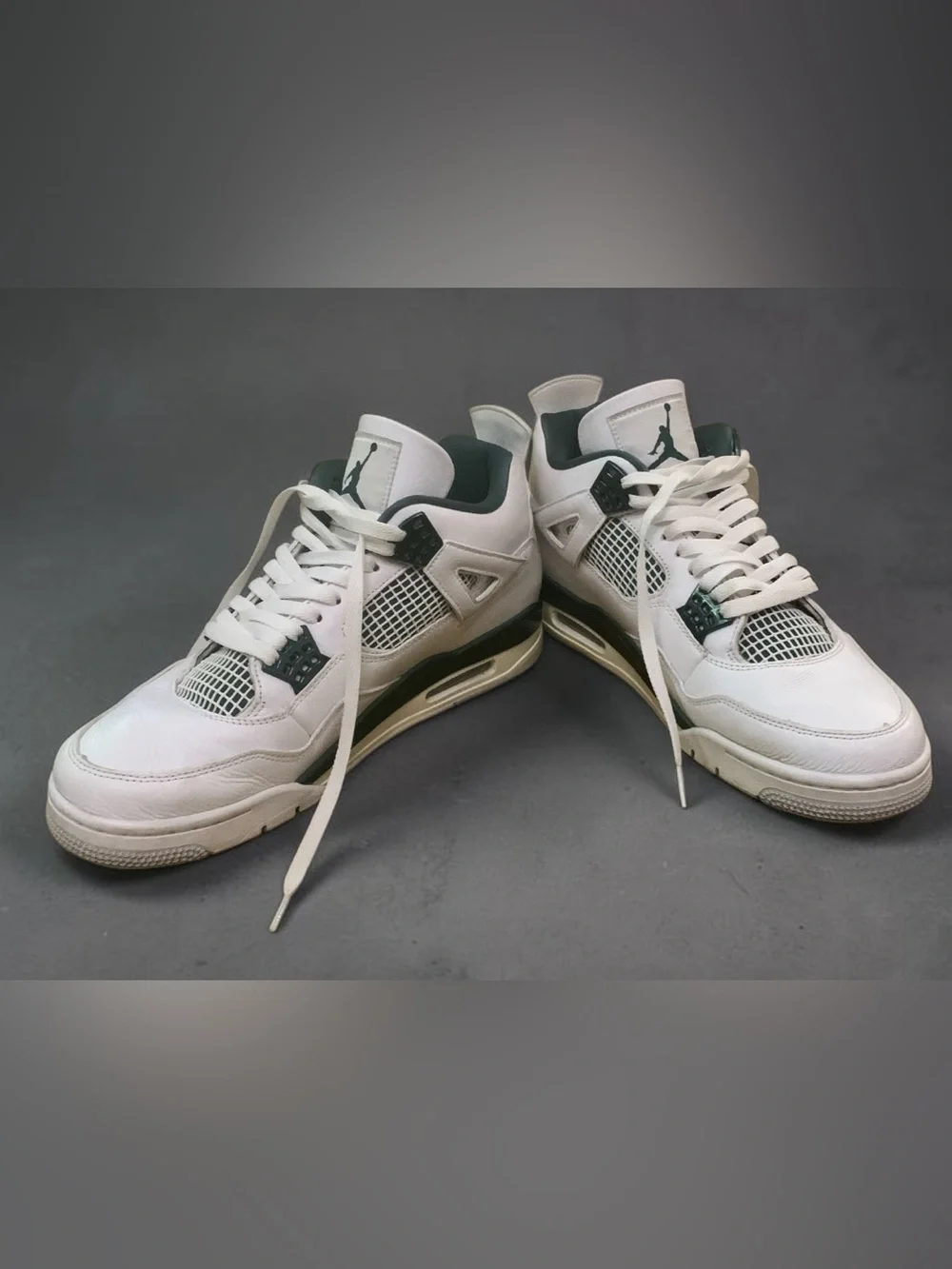 Air Jordan 4 Retro 'Oxidized Green' in original box